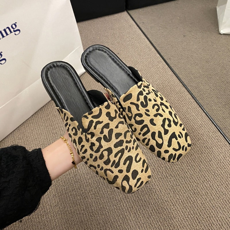 Leopard print pointed toe slippers by Plush Fashion Hub with comfortable slip-on design and stylish animal print pattern.