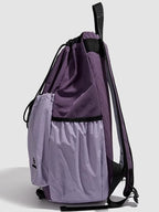 Lightweight nylon drawstring backpack for women, minimalist travel bag with black straps and simple design.