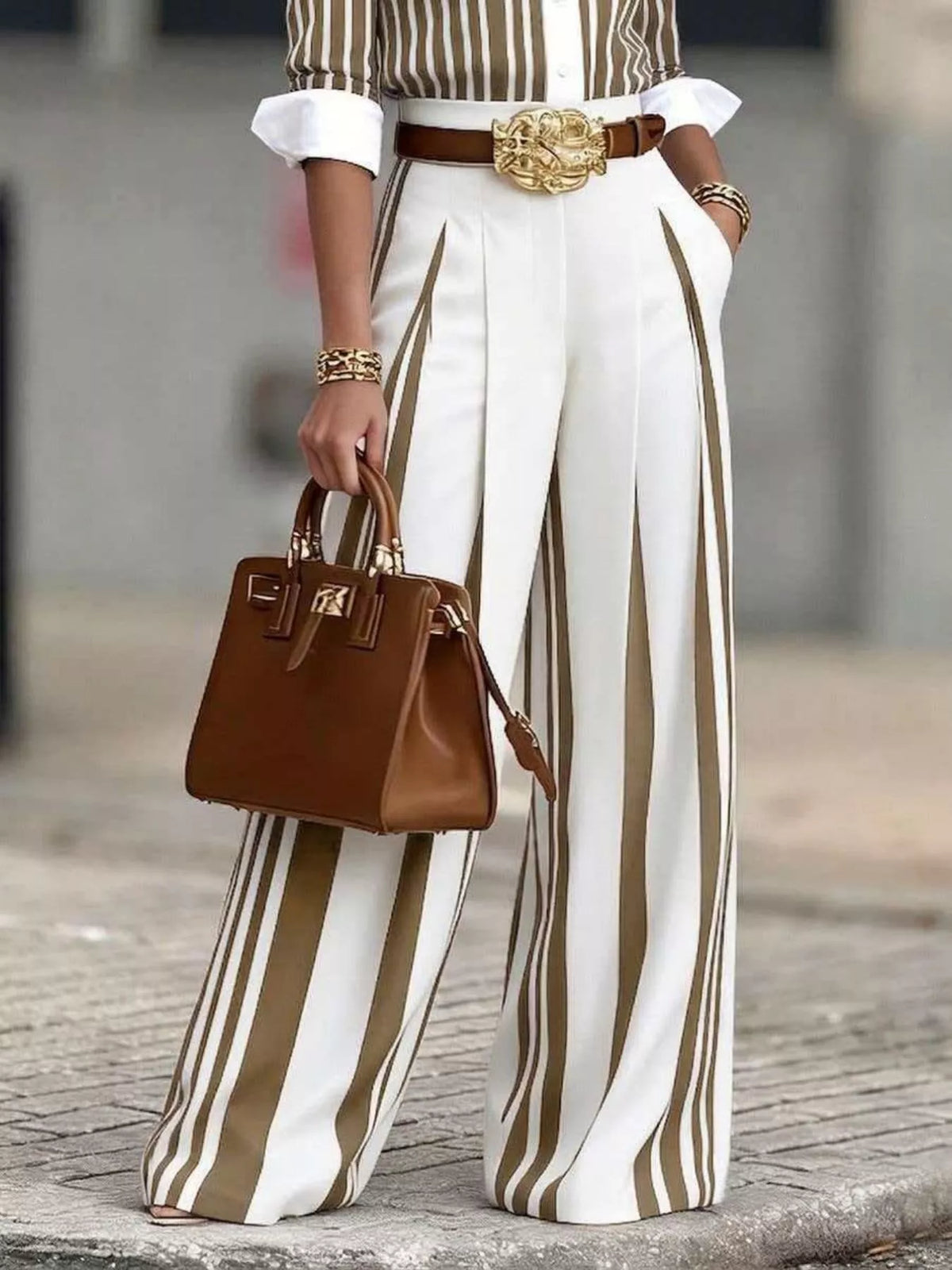 High-waisted wide-leg striped pants by Plush Fashion Hub, showing the stylish design and fit on a model.