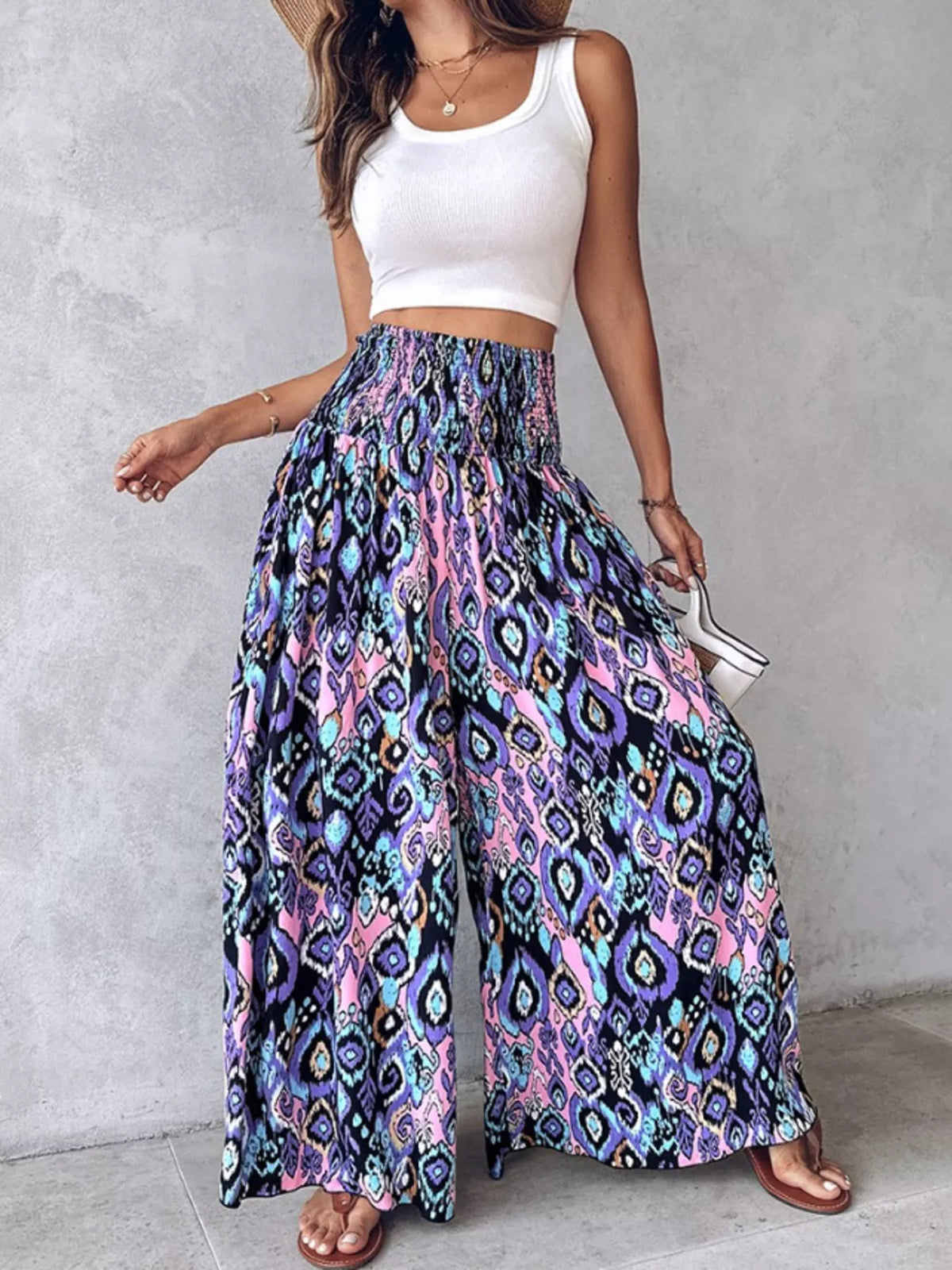 Printed wide-leg pants from Plush Fashion Hub featuring a colorful, flowy design and relaxed fit.