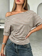 Stripe-patterned one shoulder dolman sleeve T-shirt by Trendsi featuring a relaxed fit and casual style.