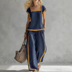 FitiqueFit solid color shirt and wide-leg trousers two-piece set, featuring a relaxed fit and comfortable fabric.