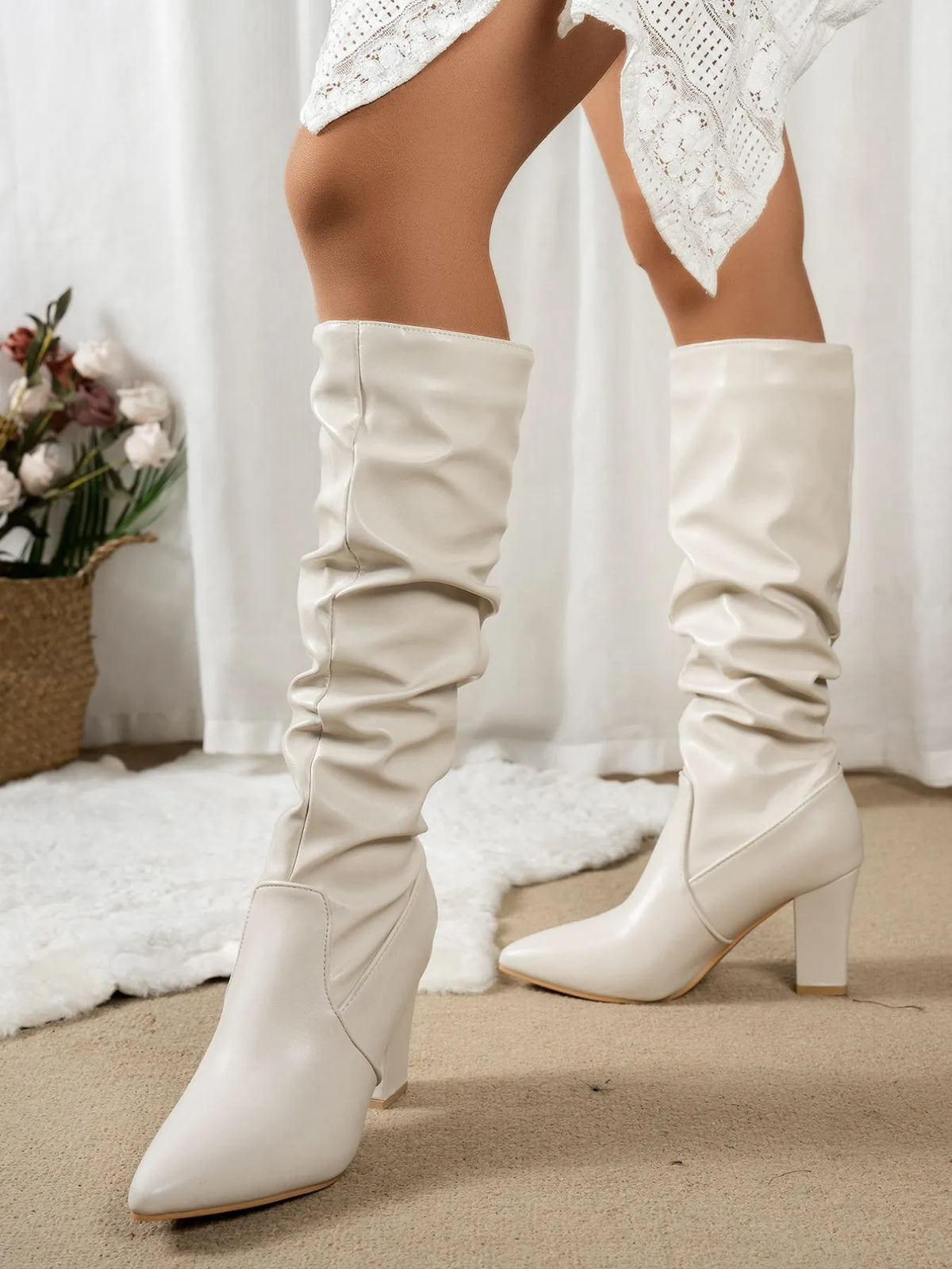 Trendsi point toe block heel boots with sleek design and stylish silhouette, featuring a smooth leather finish and sturdy heel.