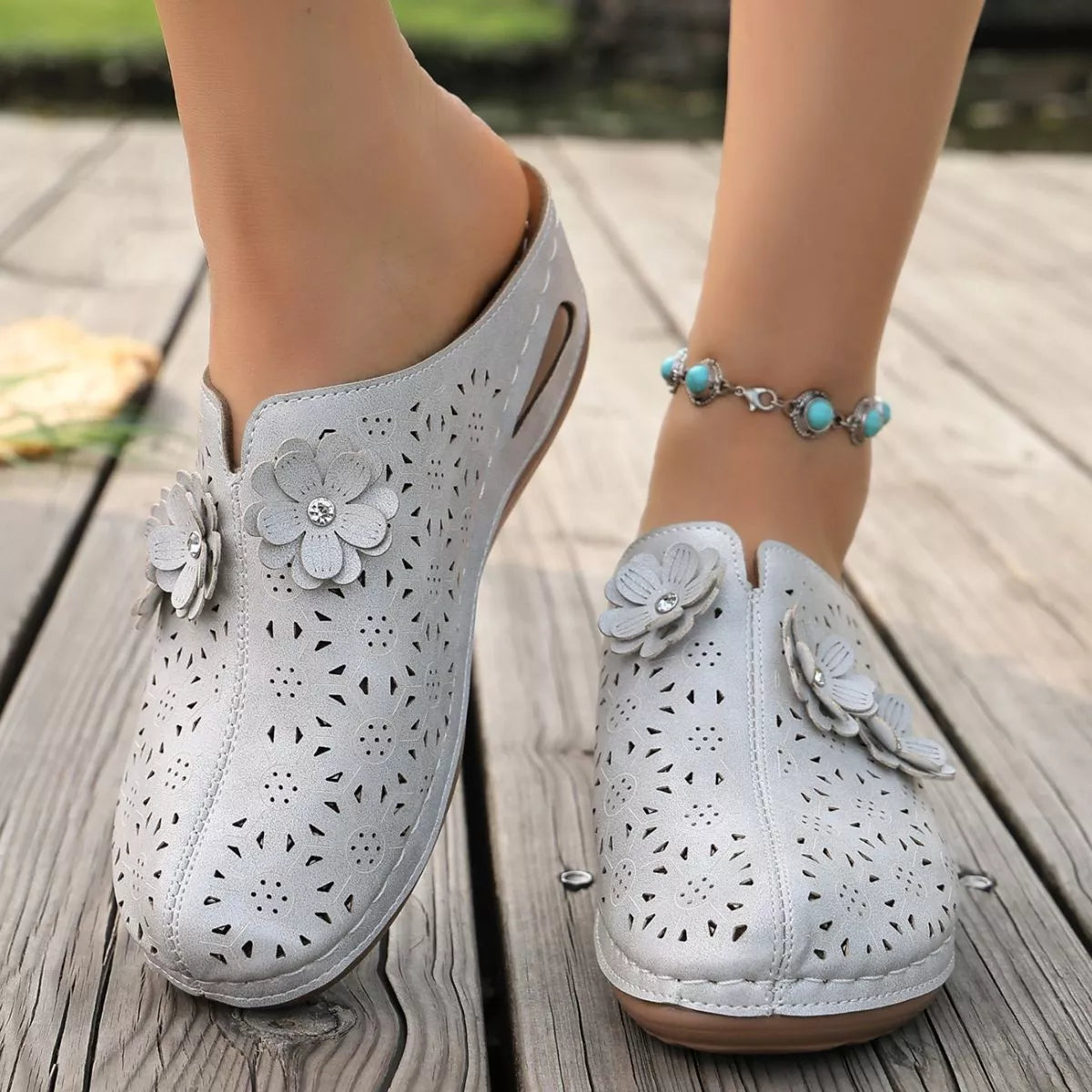 Plush Fashion Hub floral decor round toe sandals with colorful flower embellishments and comfortable flat sole.