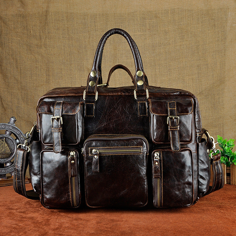 Pi-Mart First Layer Cowhide Men's 16-inch large-capacity briefcase with sturdy handles and multiple compartments for professional use.