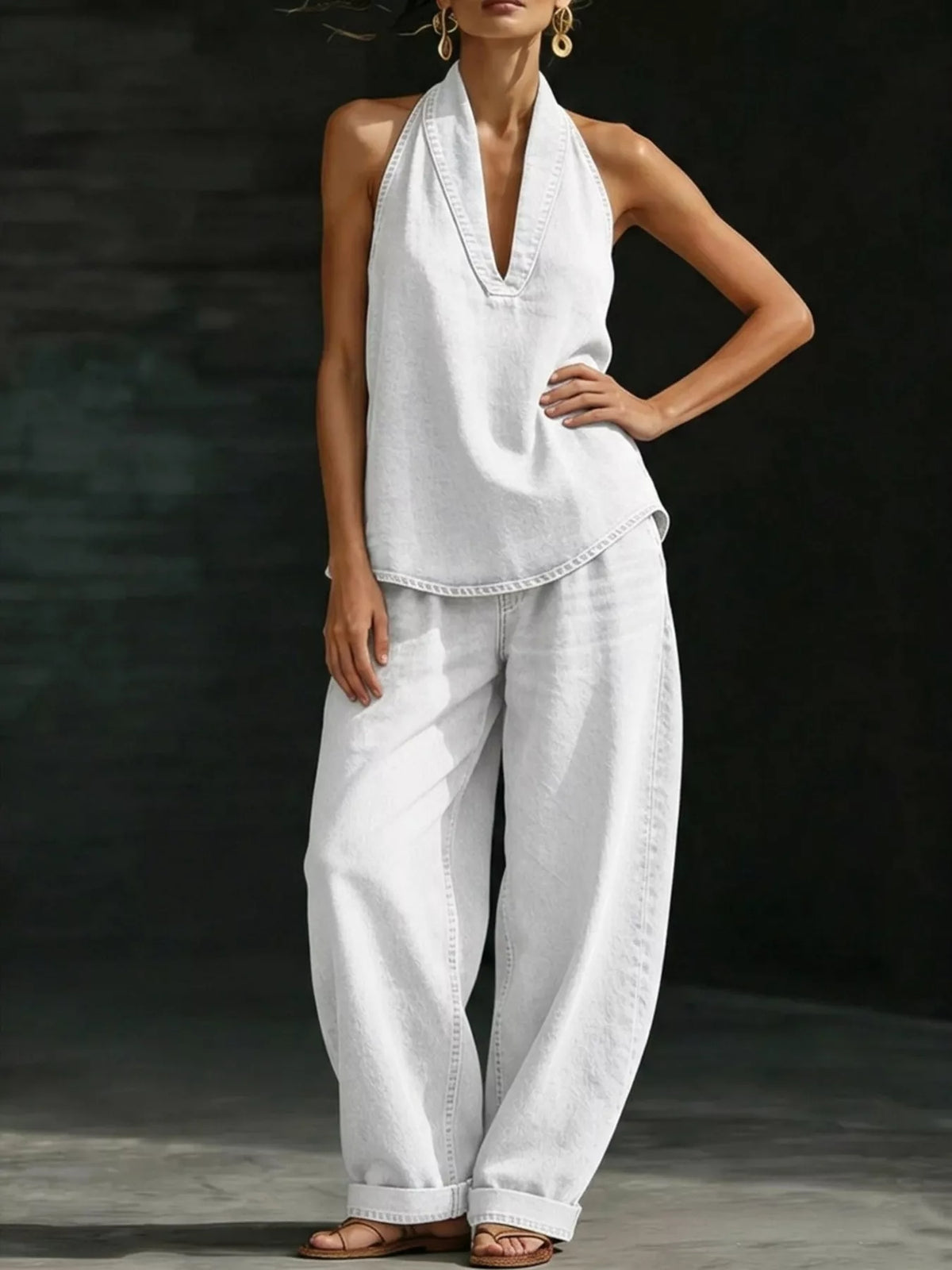 Plus size women's halter neck top and wide-leg pants two-piece set by Plush Fashion Hub, styled as a casual dress.