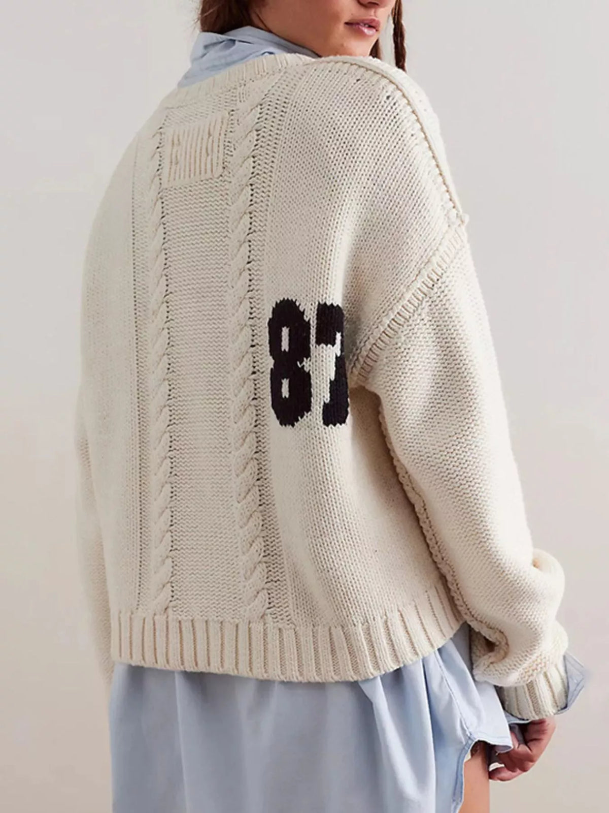 Cable-knit sweater with 78 numbers, Trendsi tops, featuring a textured knit pattern and cozy fit in a stylish casual design.