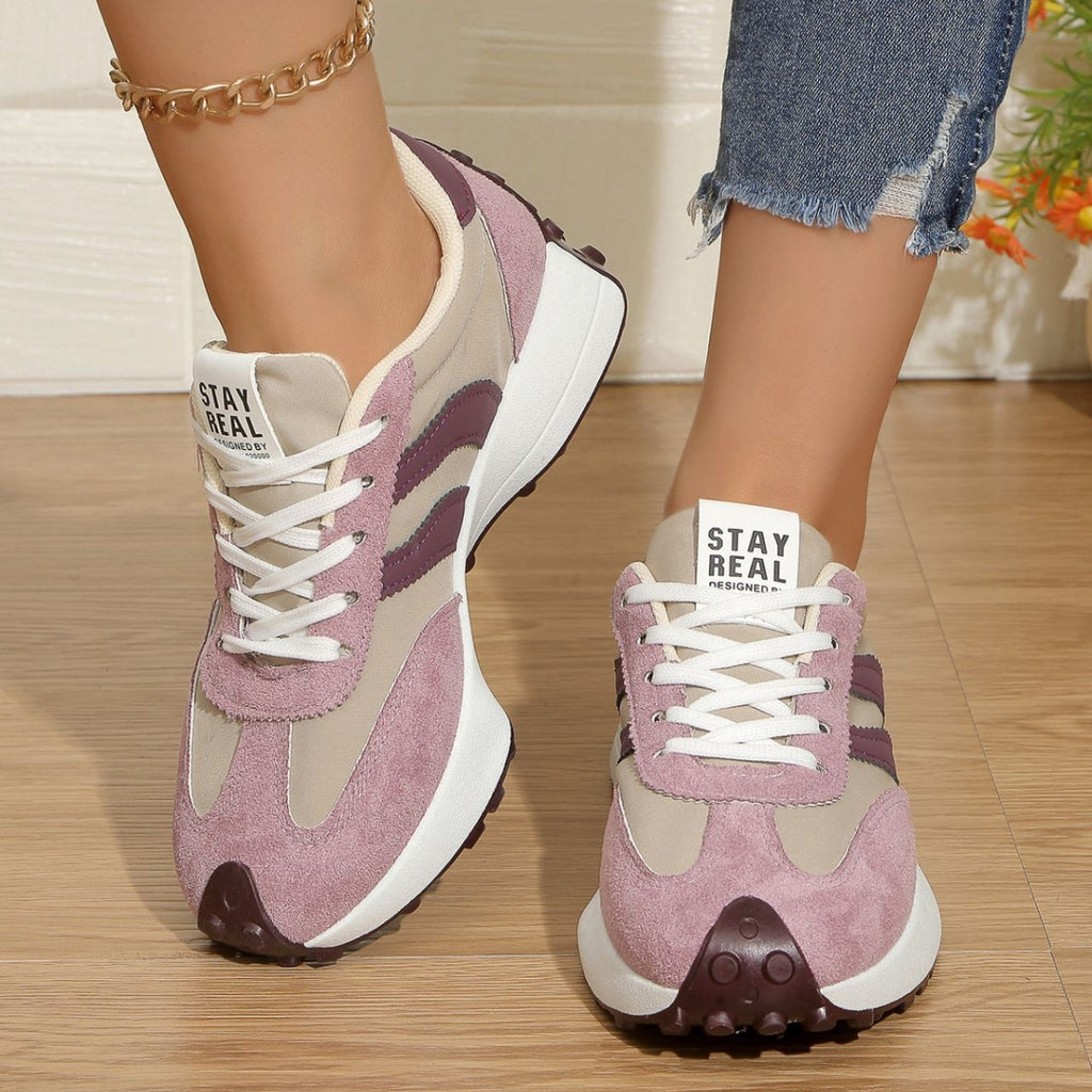Women's round toe lace-up casual sneakers by Trendsi featuring comfortable PU leather and flat design for everyday wear.