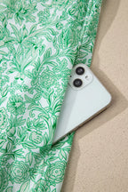 Floral midi dress with flutter sleeves and contrast trim by Trendsi, featuring a feminine design and elegant flowy fabric.
