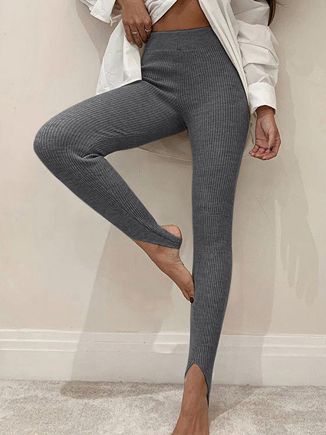 Plush Fashion Hub ribbed mid-waist leggings in black, featuring a snug fit and comfortable stretch for everyday wear.
