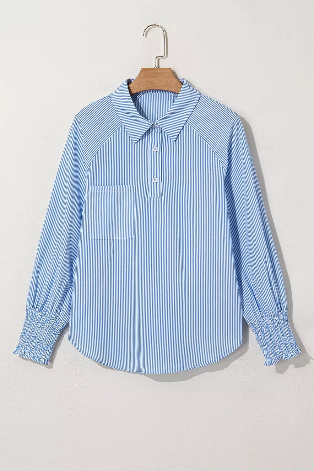 Striped smocked sleeve collared blouse from Trendsi featuring a relaxed fit and stylish design, shown on a white background.
