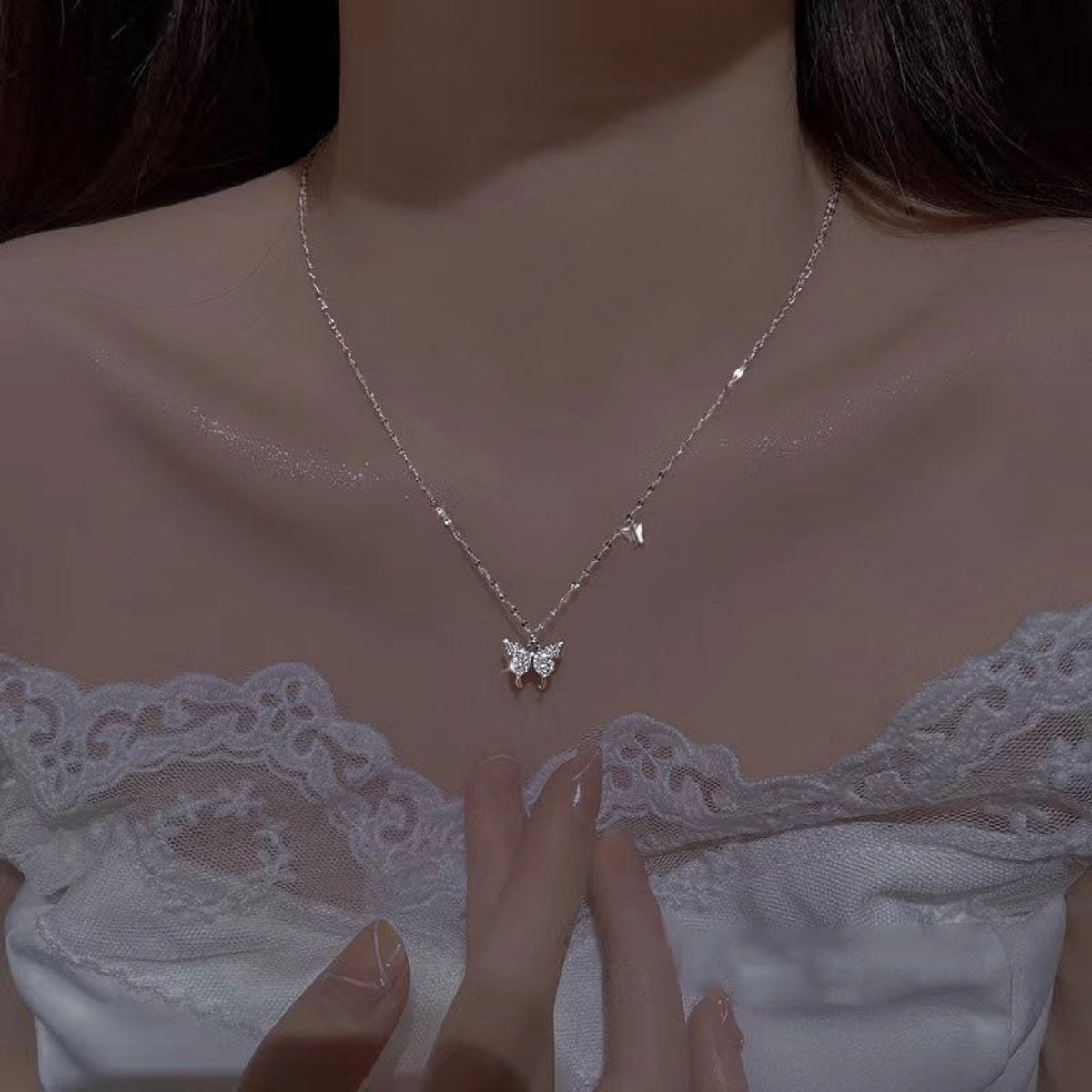 Sterling silver zircon butterfly necklace from Plush Fashion Hub featuring a delicate butterfly pendant on a silver chain.