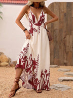 Elegant deep V-neck spaghetti strap evening maxi dress by Trendsi, floor-length gown with a flowing silhouette.