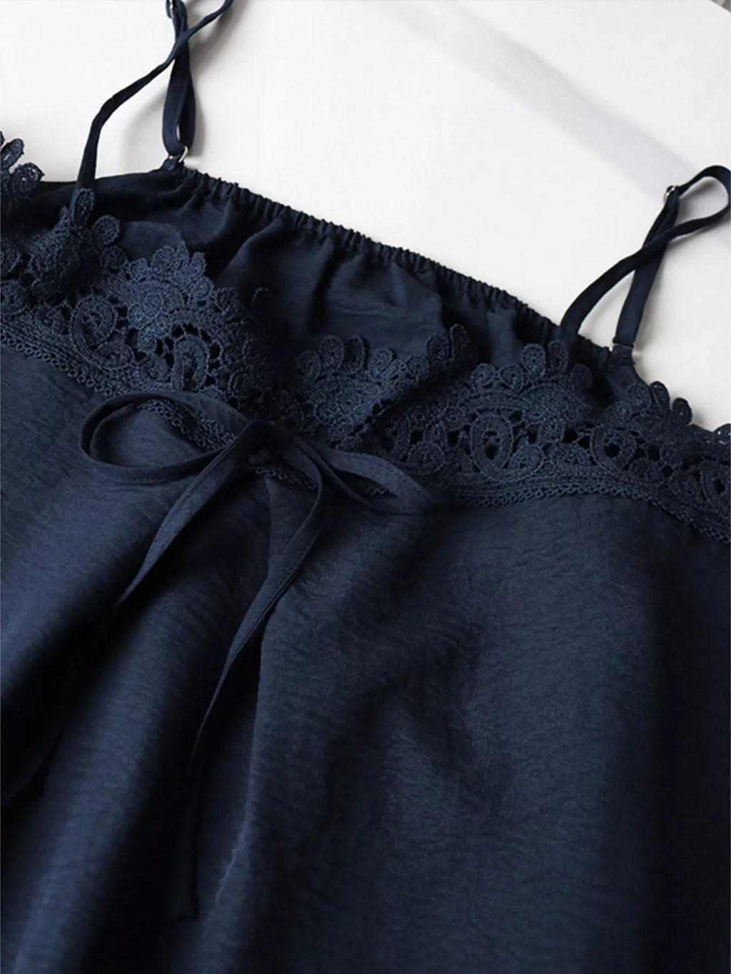 Lace trim cami and wide-leg pants set by Trendsi, featuring a stylish matching outfit with delicate lace details.