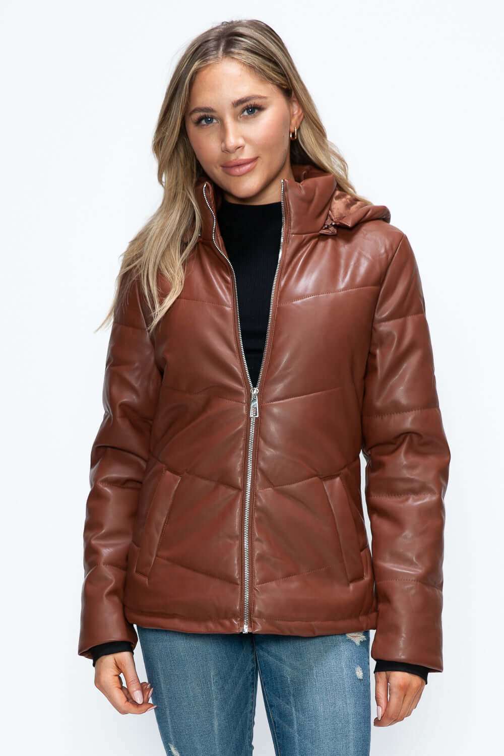 Pocketed zip-up puffer jacket with removable hood in brown pleather.