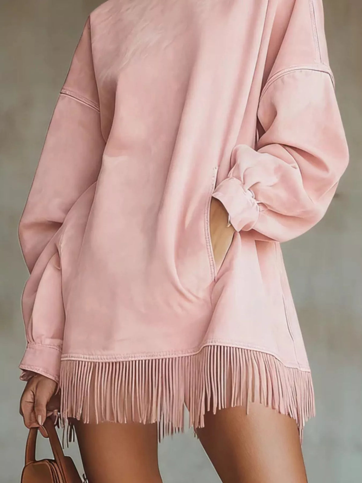 Plus size full-length sweater dress with mock neck and fringed hem, featuring long sleeves from Trendsi.