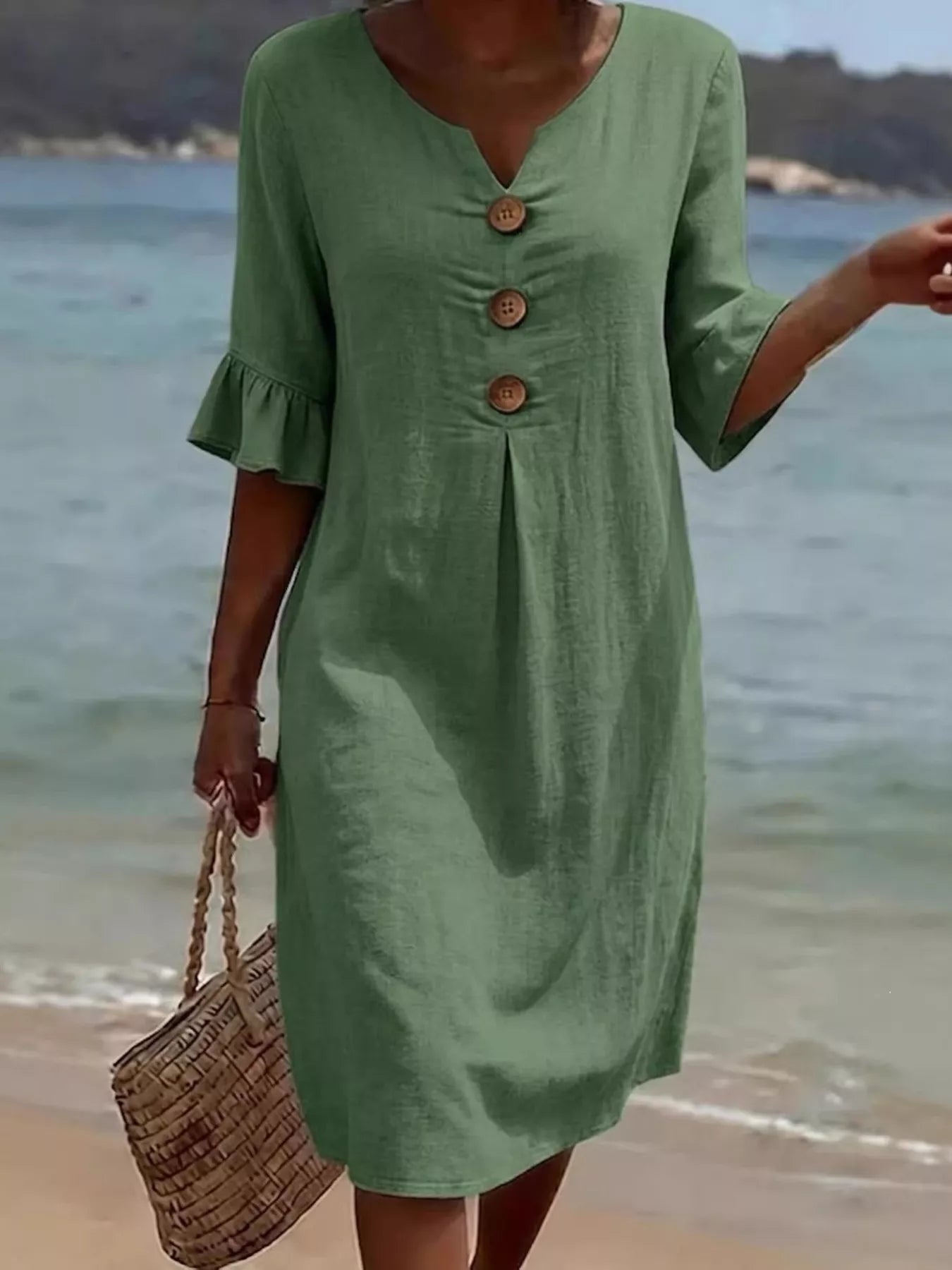 Plus size midi dress with button decor, ruffle sleeves, in a full size, featuring trendy design and elegant style.