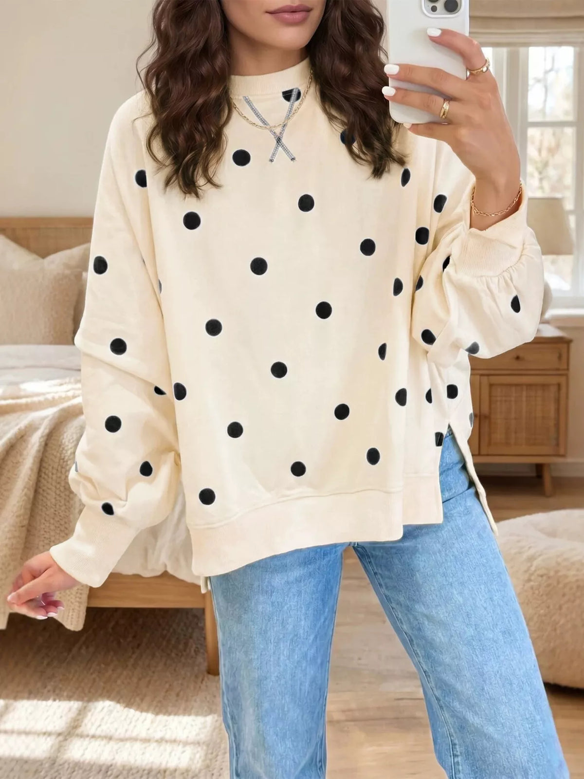 Polka dot oversized sweatshirt with side slit in black and white, casual trendy sweatshirt by Trendsi.
