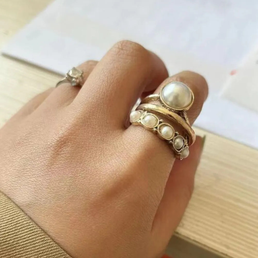 Gold-tone alloy three-layered open ring with sleek, modern design, perfect for stylish everyday wear.