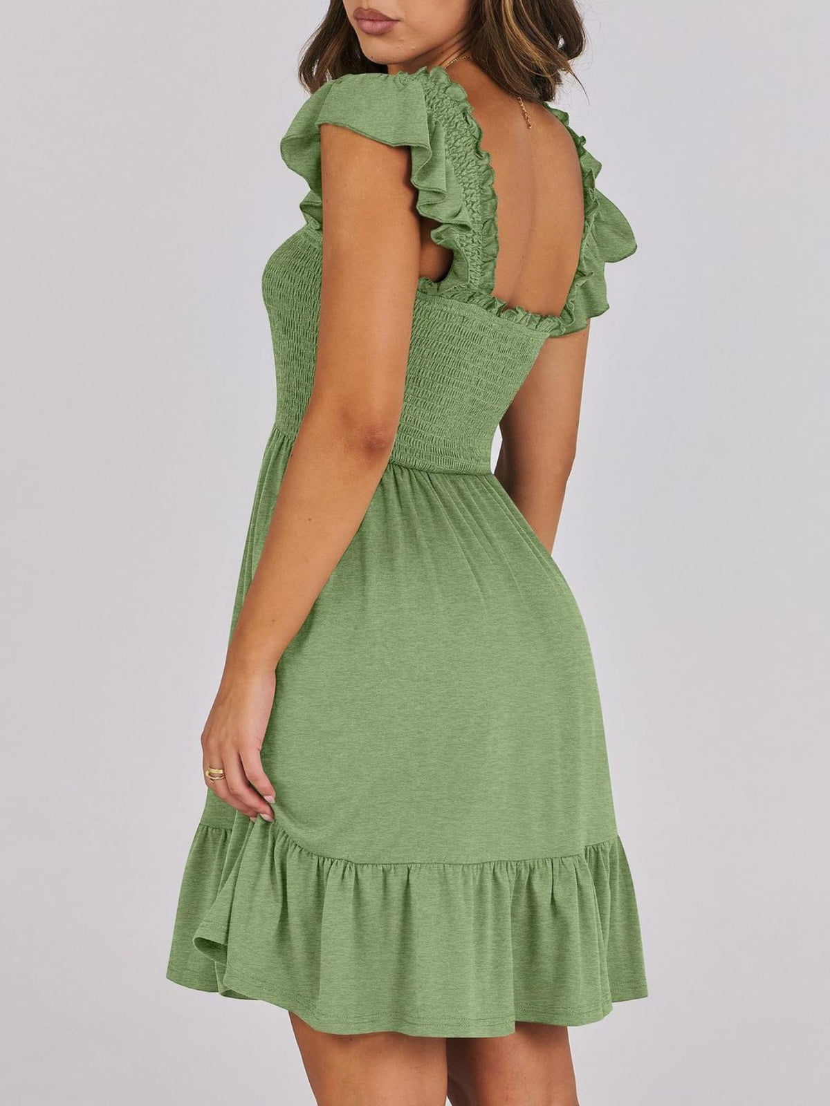 Women's lightweight summer dress by Plush Fashion Hub with smocked bodice and ruffled hem, perfect for casual warm-weather wear.