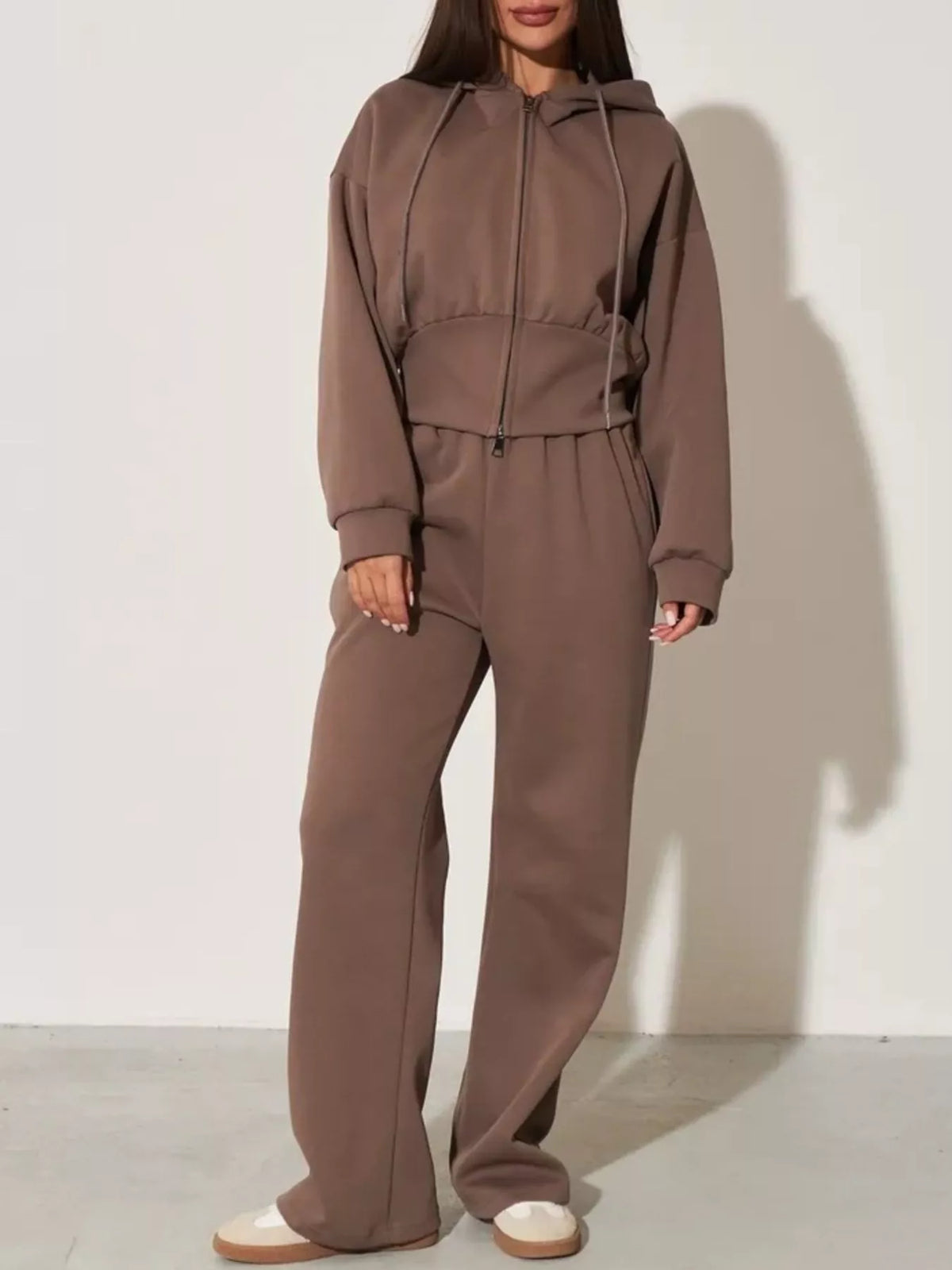 Plush Fashion Hub zip-up hoodie and wide-leg pants loungewear set in soft fabric, shown on a model with neutral background.