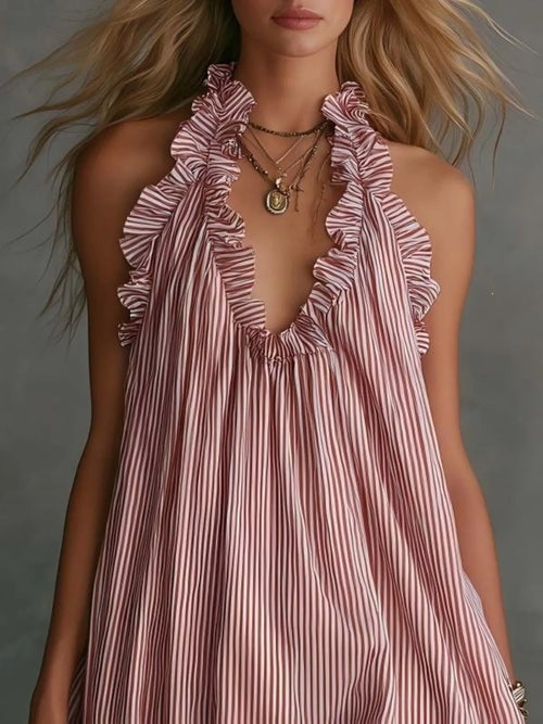 Plus size full-length ruffled trim halter neck mini dress by Trendsi, featuring a stylish design and flattering fit.