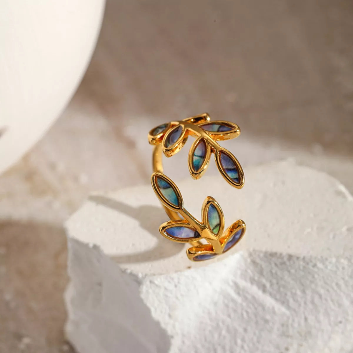 18K gold-plated resin leaf bypass ring with natural leaf design, stylish jewelry piece from Plush Fashion Hub.