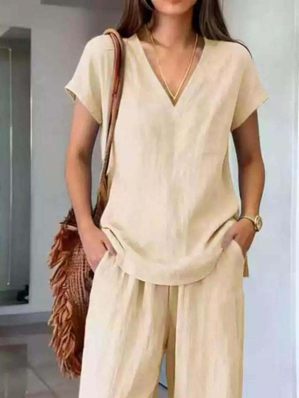Plus size lounge set featuring a V-neck short sleeve top and matching pants from Plush Fashion Hub, comfortable loungewear for relaxation.