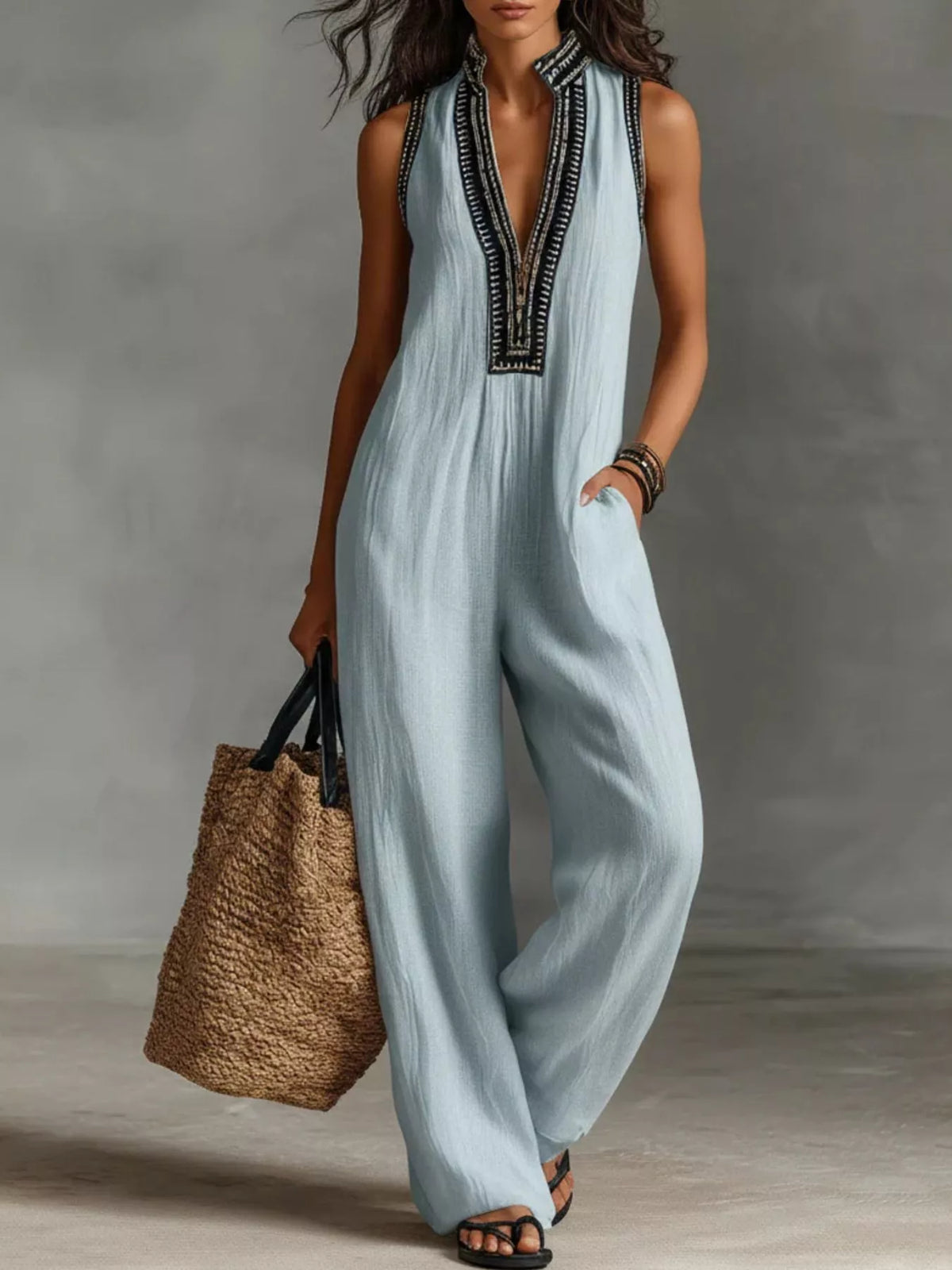 Plus size full length sleeveless wide-leg jumpsuit from Trendsi, featuring a flattering fit and stylish design.