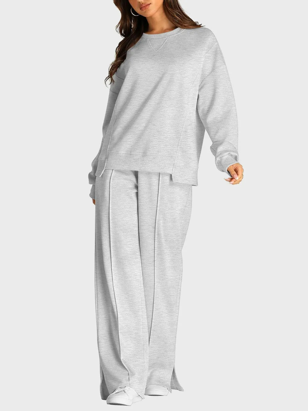 Trendsi round neck long sleeve top and slit pants set, stylish casual outfit, featuring a fitted top and wide-leg slit pants.