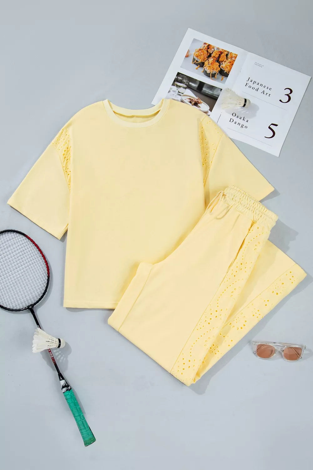 Trendsi rings half sleeve top and drawstring pants set, featuring stylish rings design, casual fit, and comfortable fabric.