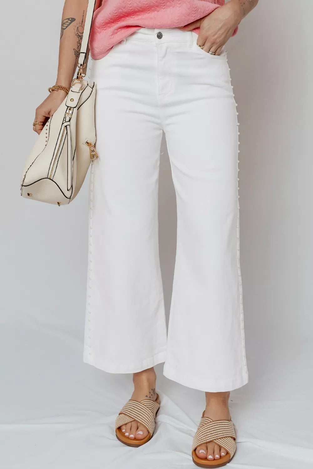 Pearl-embellished side seam ankle-length shift jeans from Plush Fashion Hub, featuring a stylish denim design with pearl accents.