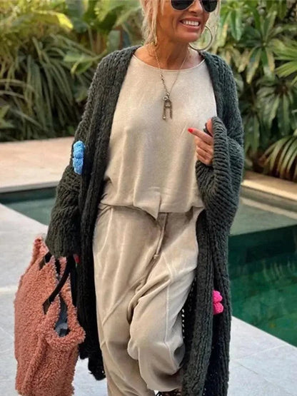 Fashion Stripe Long Cardigan Lantern Long Sleeve Oversize Knitted SweaElevate your fall wardrobe with our Fashion Stripe Long Cardigan! This chic piece features a lantern sleeve and loose, oversized fit, making it perfect for layering SweaterPlush Fashions ShopPlush Fashion Shop