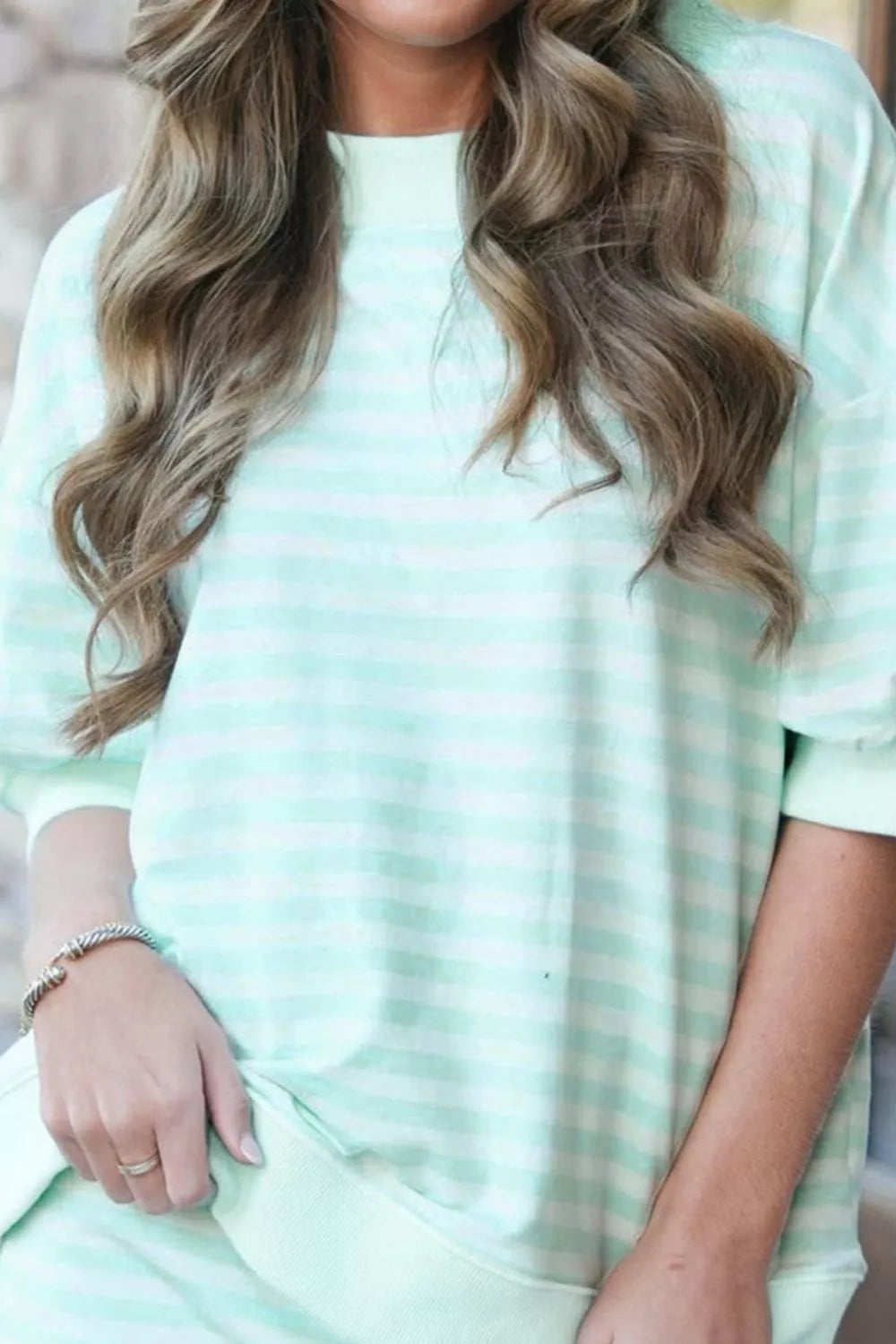 Striped round neck top and matching skirt set by Plush Fashion Hub, featuring a stylish coordinated outfit with bold stripes.