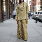 FitiqueFit irregular hem drop-shoulder top and wide-leg pants set in three colors, shown on a model with relaxed fit and stylish design.