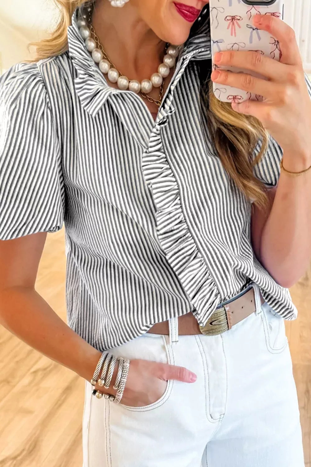 Striped ruffle short bubble sleeve shirt by Plush Fashion Hub, featuring a stylish design and ruffled accents on lightweight fabric.