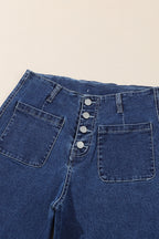 Light blue McKinley wide leg cropped jeans from Threaded Pear displayed on a hanger, showcasing relaxed fit and cropped length.