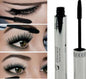 Long curling eyelash extension black fiber mascara for dramatic eye makeup transformation.