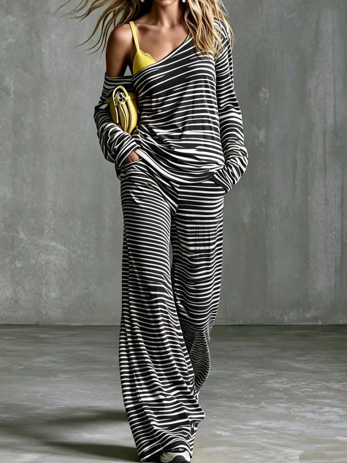 Women’s striped boat neck top and pants set by Trendsi, featuring a casual, stylish matching outfit with striped pattern and comfortable fit.