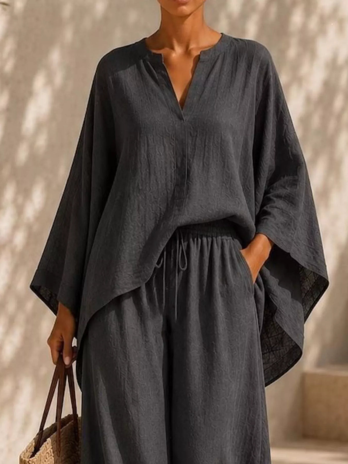 Plus size plush fashion hub loungewear set with long sleeve notched top and wide-leg pants, comfortable and stylish for relaxing.