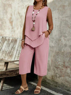 Casual solid-colored sleeveless top and cropped pants two-piece set by Plush Fashion Hub, displayed on a neutral background.