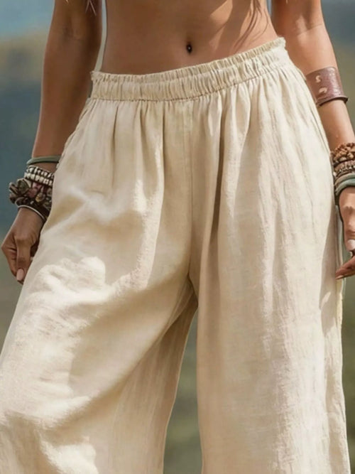 Plus size bohemian wide-leg pants by Trendsi, full-length image showing flowy, comfortable wide-leg design and relaxed fit.