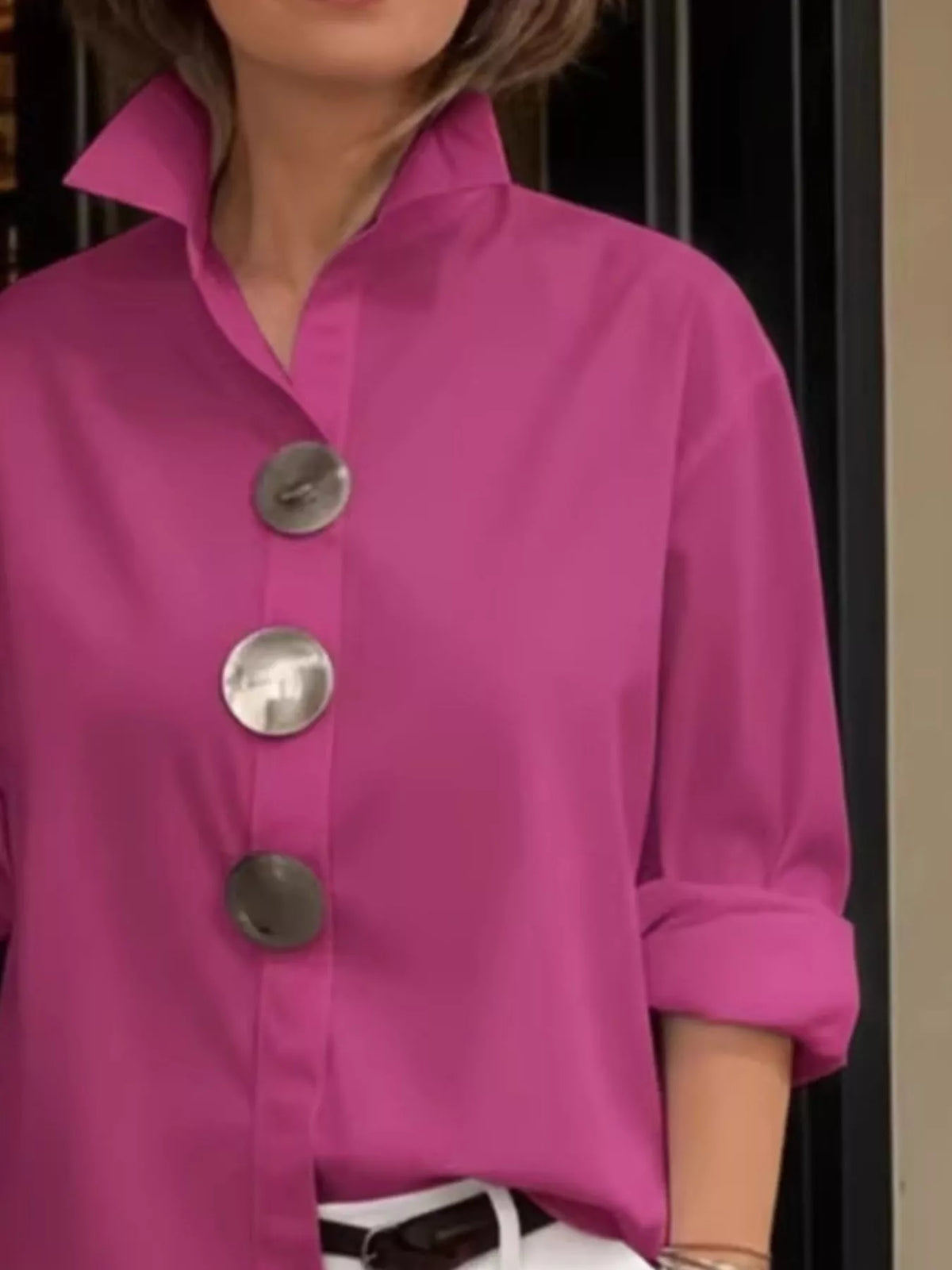 Full size oversized metal button long sleeve shirt in plus size, featuring a relaxed fit and trendy design by Trendsi.