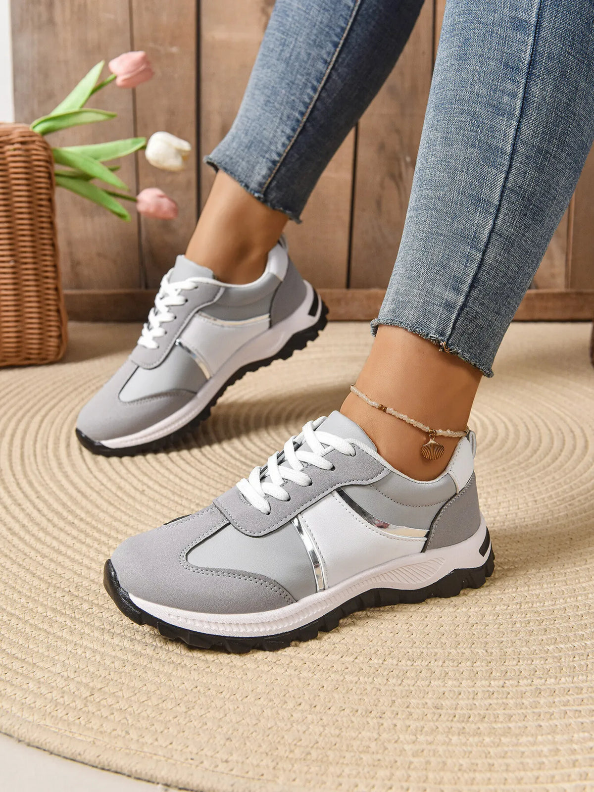 Contrast lace-up sneakers from Trendsi featuring stylish design and comfortable footwear for casual wear.