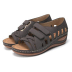 European and American large size hollow platform Velcro sandals by LadyShow.Store, featuring a chunky sole and adjustable strap.
