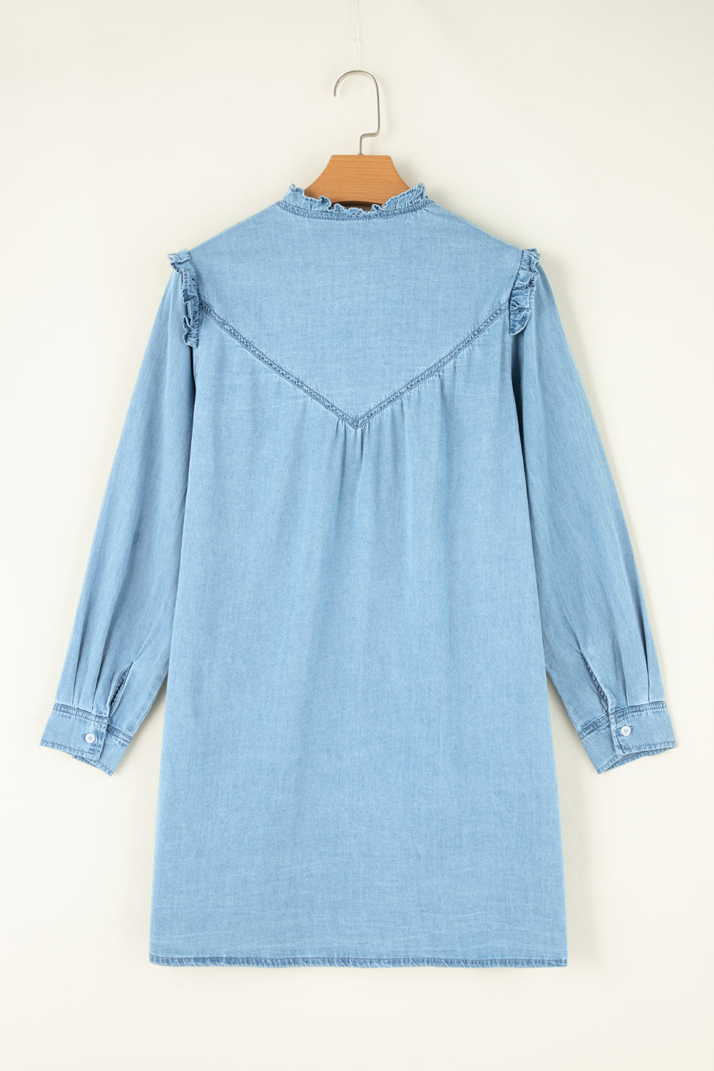 Button-up notched long sleeve denim dress from Plush Fashion Hub, featuring classic style and detailed notched collar.