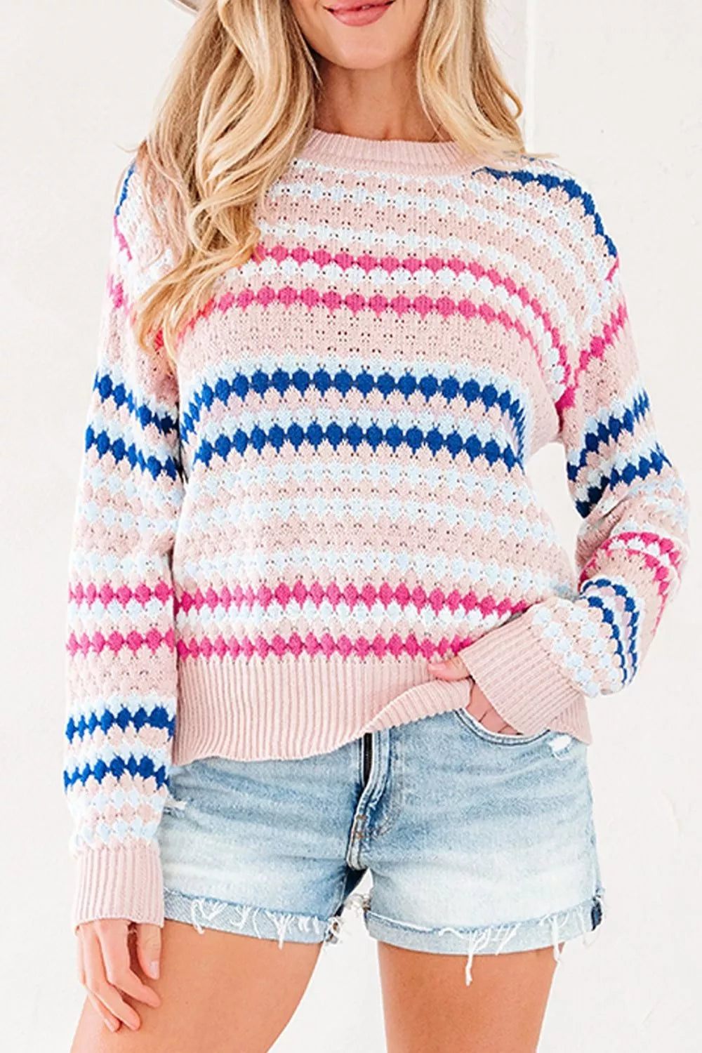 Women's striped geometric pattern sweater by Trendsi, featuring bold horizontal stripes and a cozy knit texture.