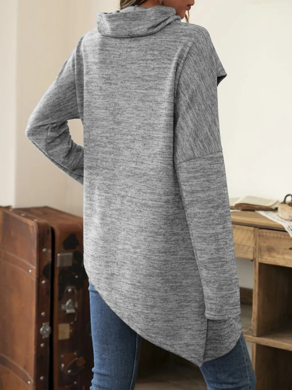 Long sleeve cowl neck t-shirt with asymmetrical hem from Plush Fashion Hub, shown in a stylish, fitted top with draped neckline.