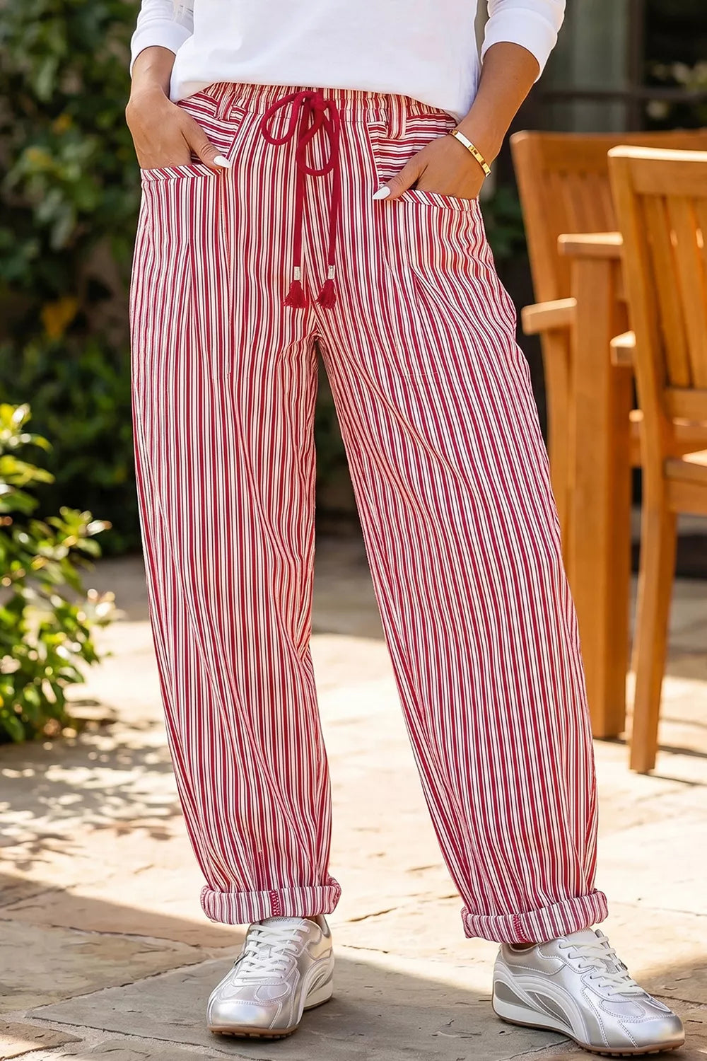 Light gray stripe drawstring casual loose pants by Trendsi, showing relaxed fit and comfortable waistband in a product image.