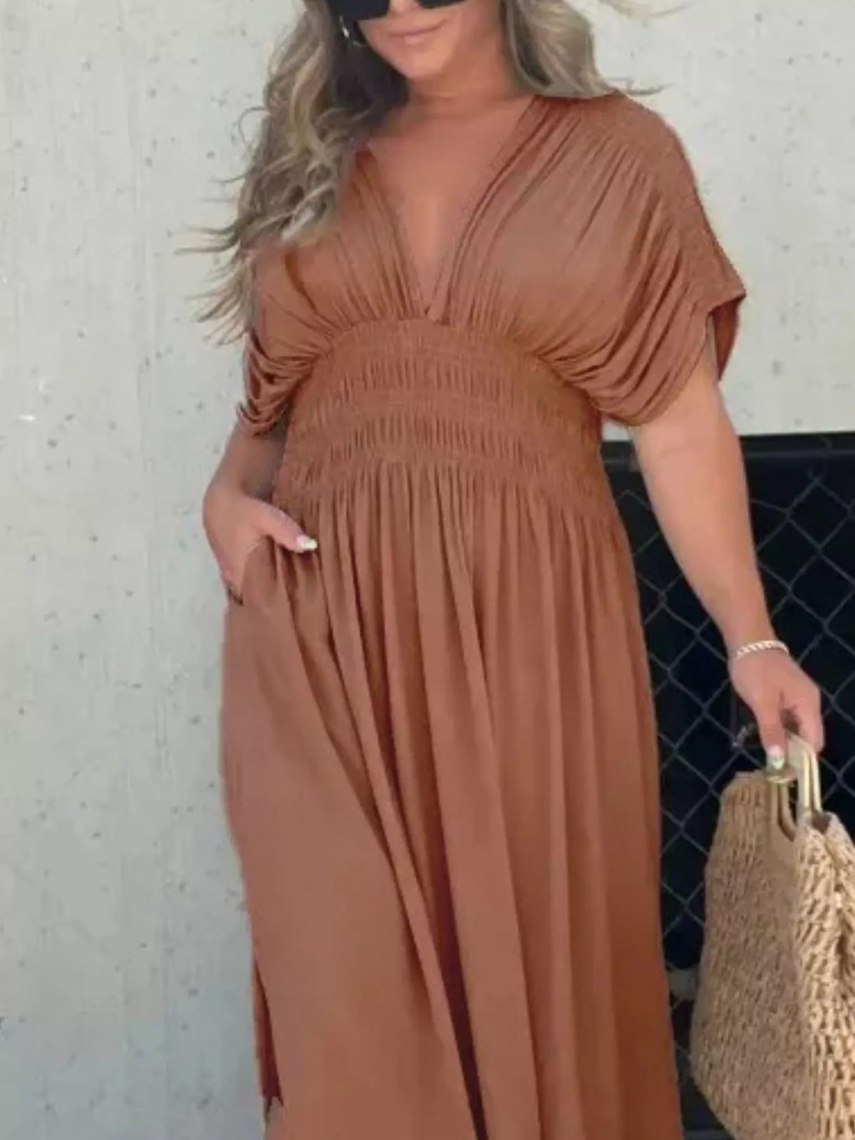 Plus size full slit V-neck smocked waist maxi dress by Plush Fashion Hub, featuring a flowing silhouette and elegant design.